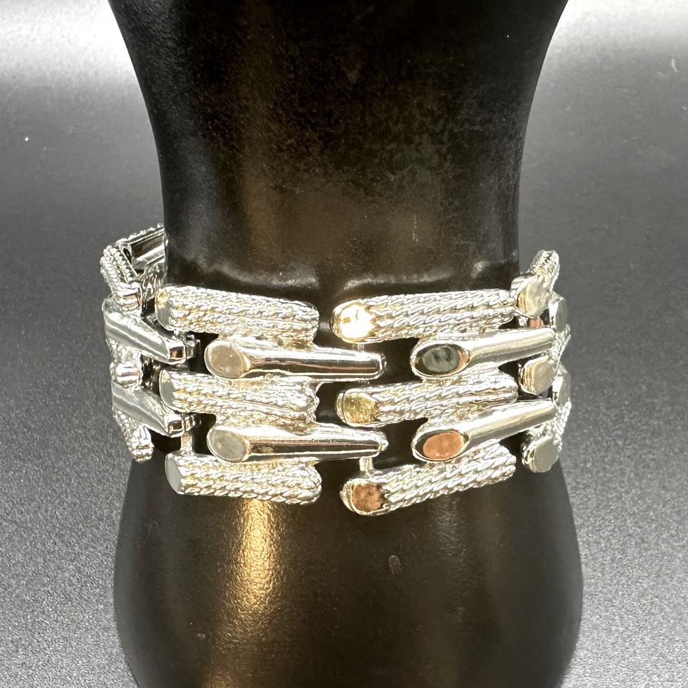 Classy, silver tone, textured, smooth bracelet, you are sure to love